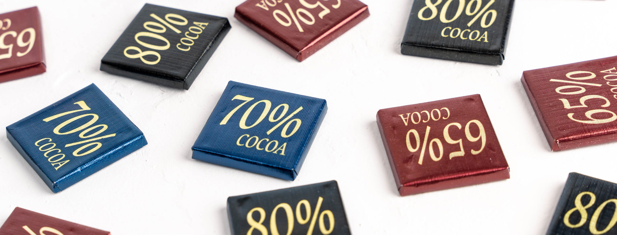 Chocolate bars ranging from 50% to 80% cacao side by side
