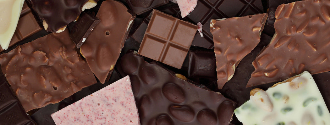 Milk chocolate squares showing smooth creamy texture