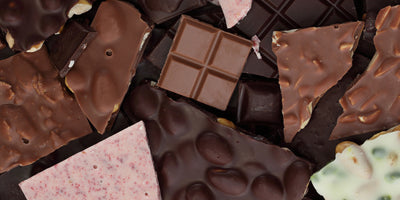 Milk chocolate squares showing smooth creamy texture