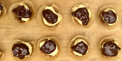 No-bake chocolate ganache tartlets arranged on plate