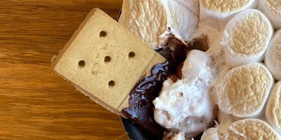 Warm s'mores skillet dip with melted chocolate and toasted marshmallows