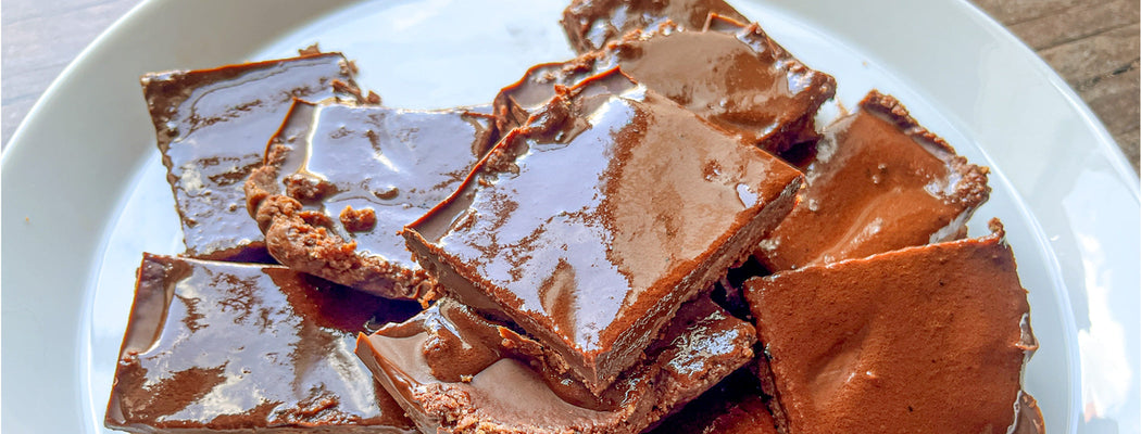 Triple chocolate brownie bars sliced and stacked