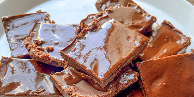 Triple chocolate brownie bars sliced and stacked
