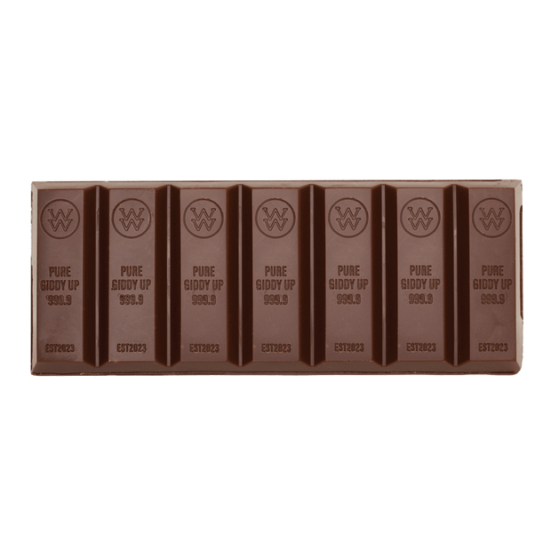 A chocolate bar with seven evenly spaced vertical sections, each embossed with the brand logo and the text 'PURE GIDDY UP 999.9'.